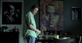Seth Rogen in front of Barbarella mosaic poster.
Still frame from 